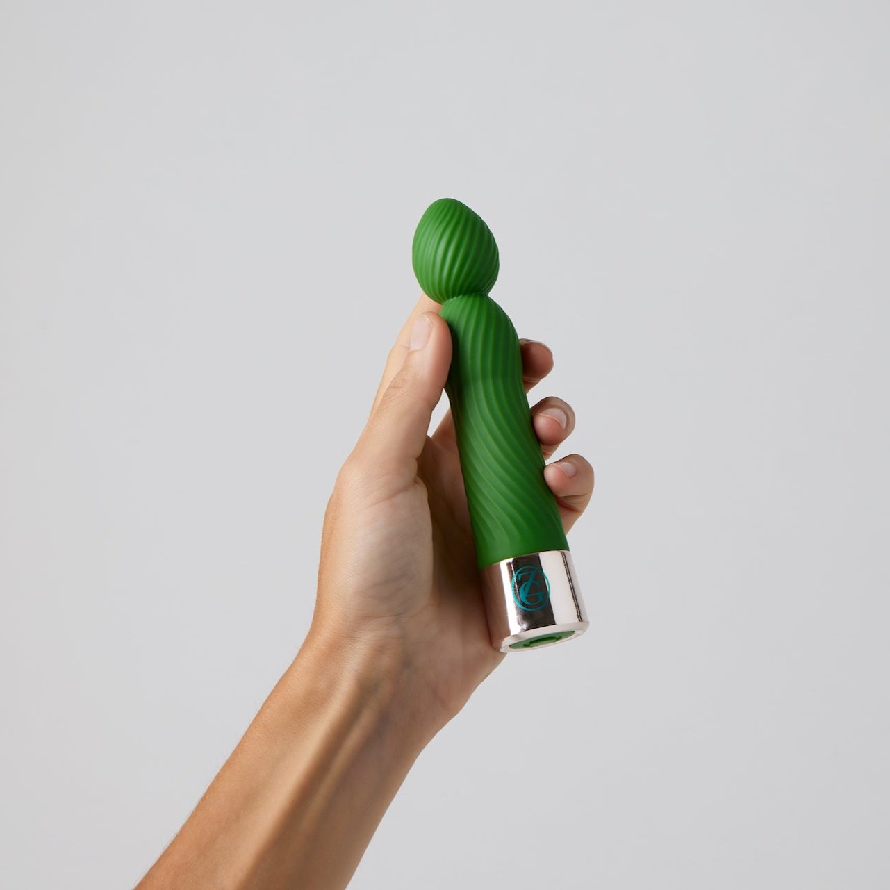Hand Holiding Le Jardin Royale Zigu Stimulator